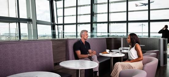 Passengers in the Aspire Airport Lounge at London Heathrow Airport Terminal 5