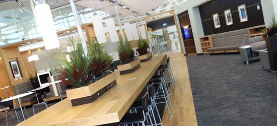 Seating area of the Transborder Aspire Airport Lounge at Calgary Airport