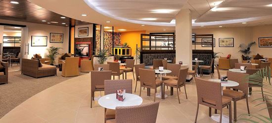Seating area at the Club Mobay Airport Lounge in Montego Bay International Airport