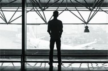 A man standing in an airport