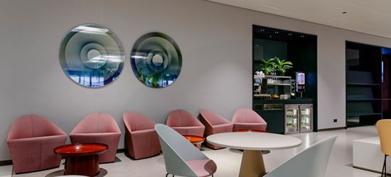 Seats and Tables At The Aspire Lounge at Amsterdam Schiphol Airport