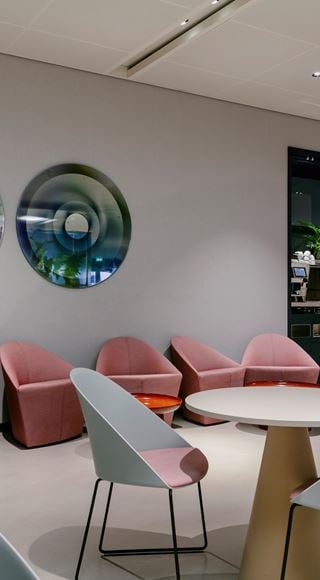 Seats and Tables At The Aspire Lounge at Amsterdam Schiphol Airport
