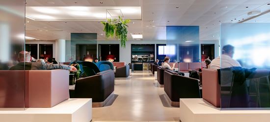 Guests Enjoying The Amsterdam Schiphol Airport Lounge 