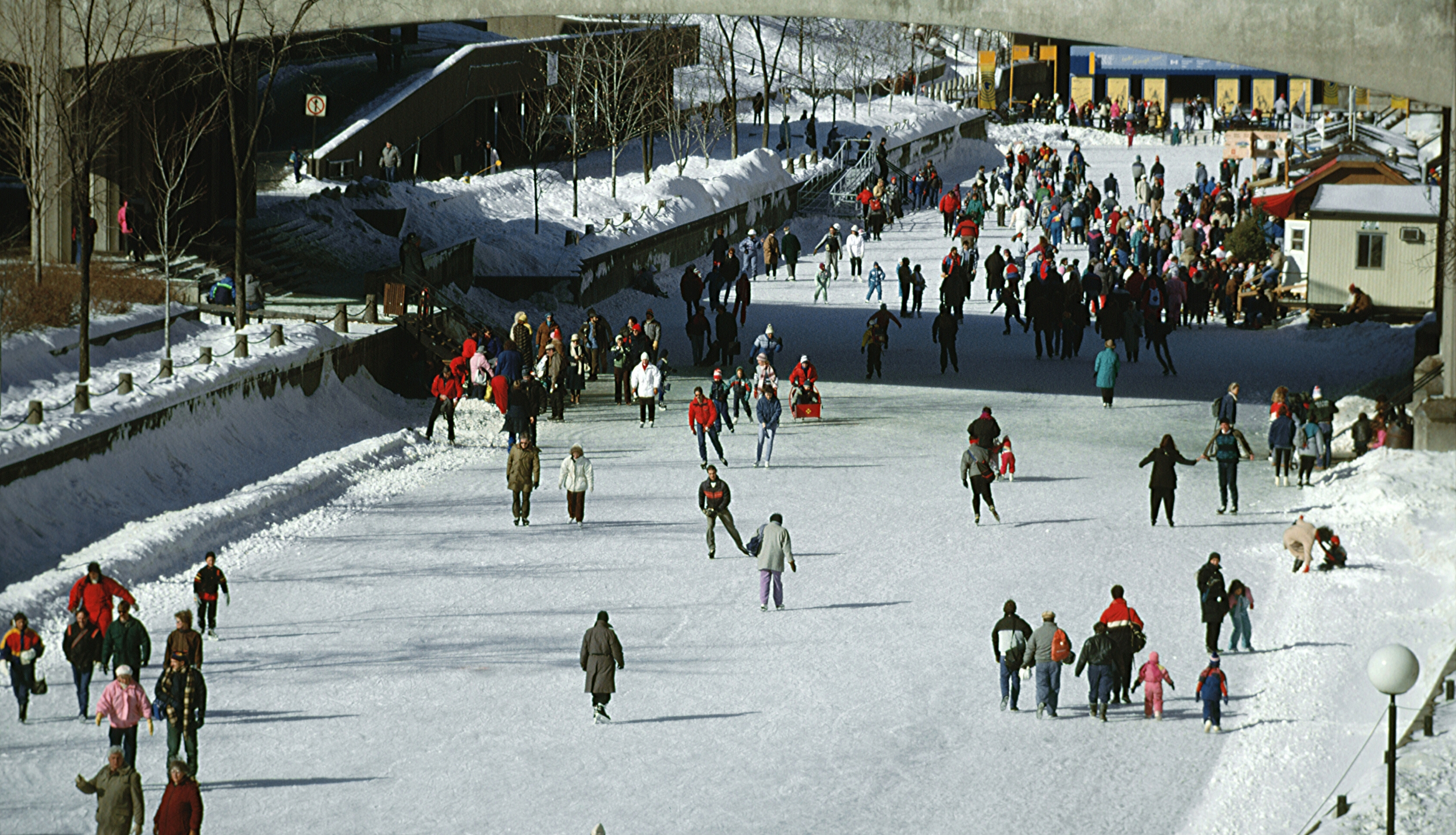 People ice skating at Rideau Canal Skateway in Ottawa Canada