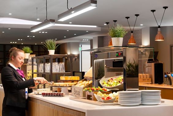 Staff Replenishing Buffet at London Gatwick North Terminal Club Aspire Lounge