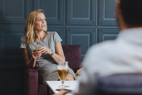 Guests with Drinks at Club Aspire Airport Lounge in London Heathrow Airport Terminal 3