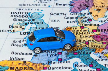 Image of a car over a map of Europe